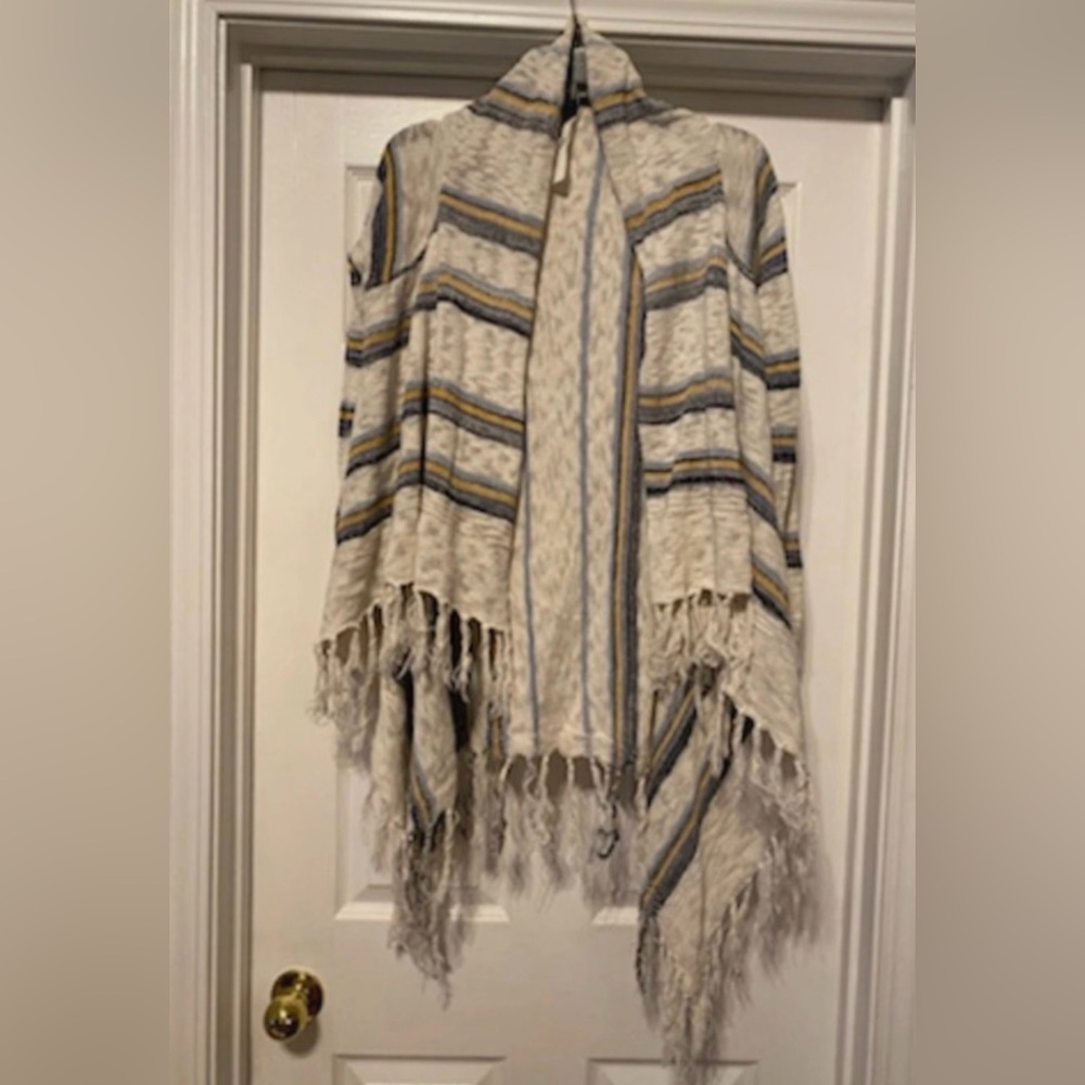 Forever 21 long sleeve cardigan is a size Small.